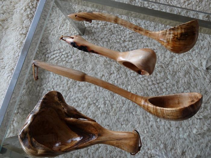 Hand carved ladles, carved from alder burl. Same artist who modified the Barbie head.