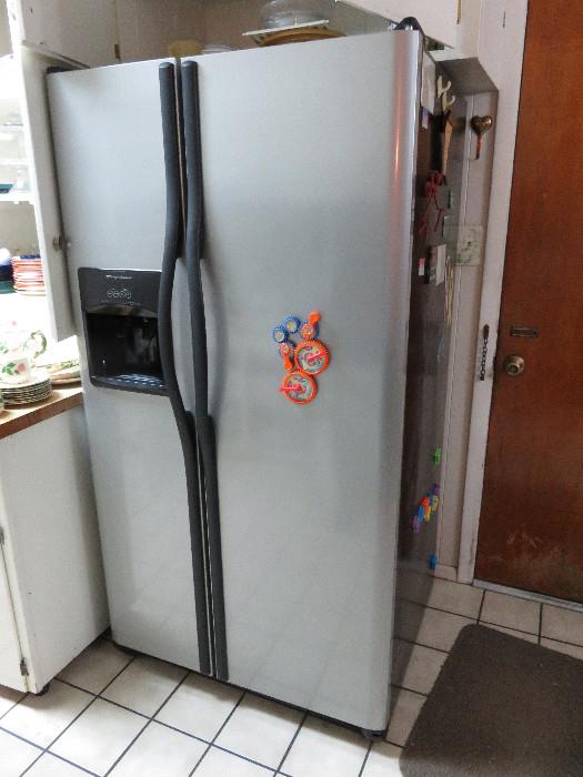 Refrigerator with ice and water in door