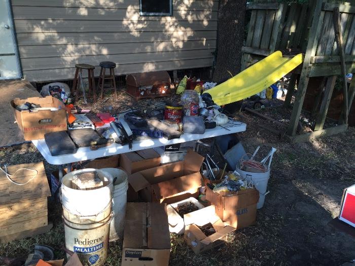 Misc. in back yard including lots of parts for small engines. Some new, others used.