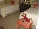twin beds with beautiful bedding, also other matching accessories