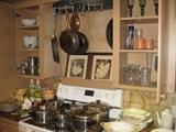kitchen full of beautiful dishes and cookware
