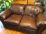Leather sofa, loveseat, chair and ottoman. Chair and ottoman show more wear.