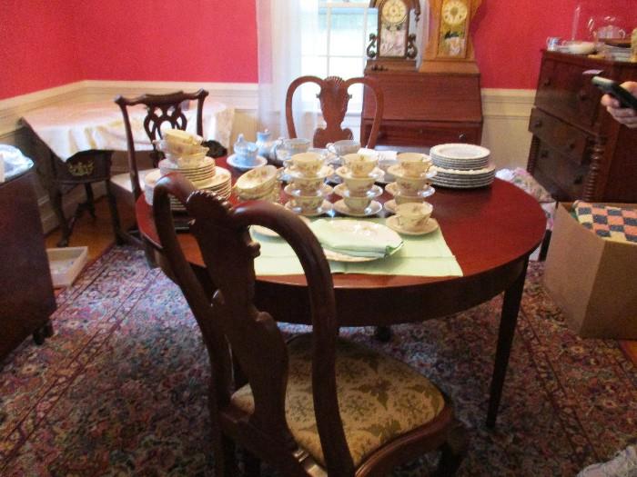 MAHOGANY DINING TABLE AND 6 BALL AND CLAW DINING CHAIRS