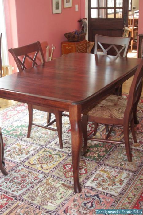 Dining table and rugs; chairs not available