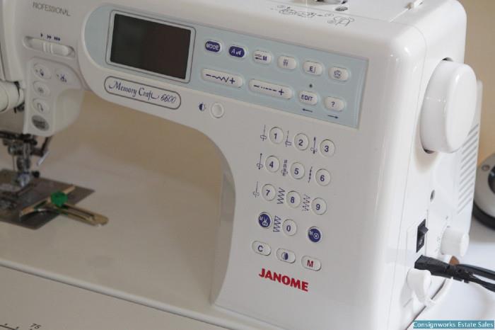 Janome Memory Craft 6600 sewing machine with table