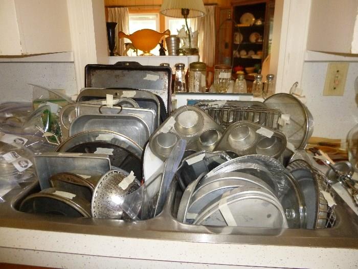 Lots of aluminum dishes