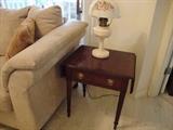 Mahogany end table with drop leaf sides