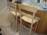 2 bar stools, light wood