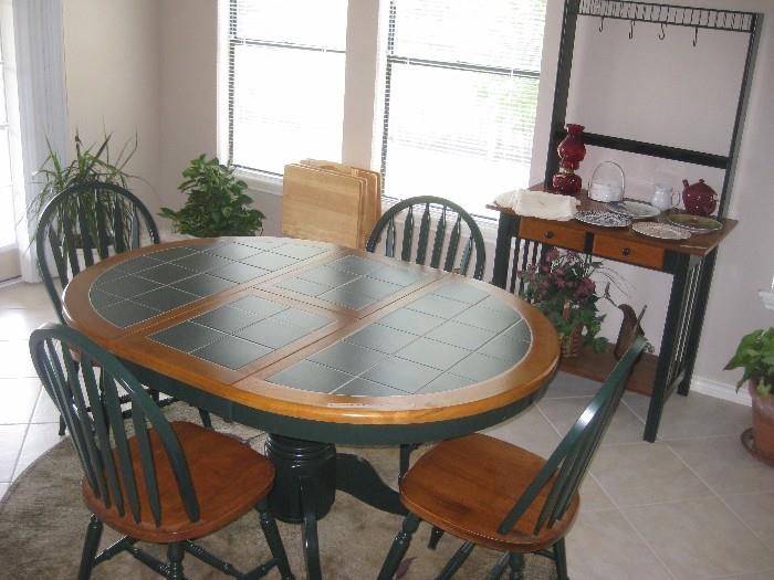 Cute kitchen table and 4 chairs, matching bakers rack