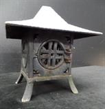 Pagoda styled candle holder                                           www.CTOnlineAuctions.com/SandhillsNC