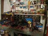 work bench with selection of hardware and small items