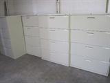 several lateral file cabinet and desk units