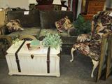 very nice brown sofa with matching chair and pillows ready for your room