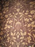BROWN AND TAUPE AREA RUG
