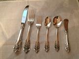 Service for  8
Grande Baroque sterling flatware. 