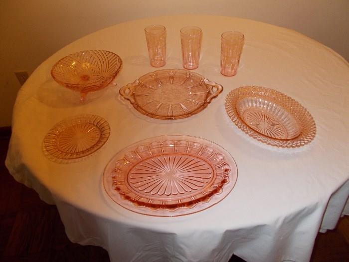 Lots of Pink Glass - Bottom - Pink Oval Colonial (Knife & Fork) Platter ; left of it - Pink Queen Mary Depression Glass Bread/Butter Plate; top of that - Pink Swirl 3 Toed Bowl; 3 Pink Etched Depression Glass glasses; beneath glasses - Pink Cherry Blossom 2 Handled Sandwich Platter; right of that - Pink Miss America Depression Glass Oval Bowl - all BEAUTIFUL!!!!!!!!!!!!