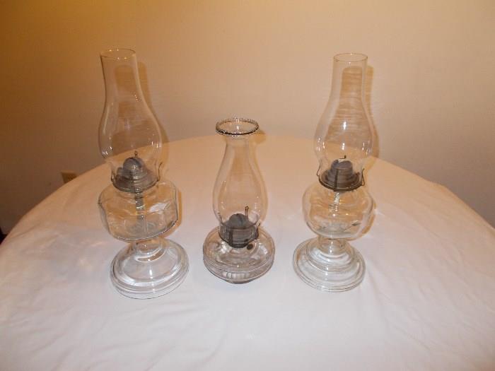 3 Clear Oil Lamps - 2 tall ones - 1 short one...
