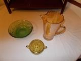 Depression Era Glass - Left: Green Bowl; Right: Marigold Pitcher (9.5" tall); Bottom: Amber Covered Sugar