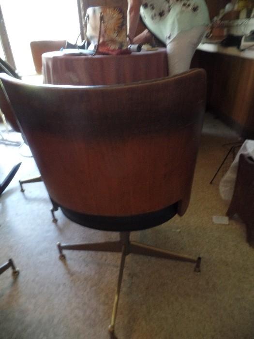 Set of 4 vintage plywood swivel chairs