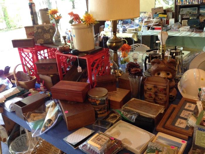 lots of wooden boxes, wooden wall decor, glass vases, card making supplies, scrapbooking supplies, jewelry making supplies, baskets, and more