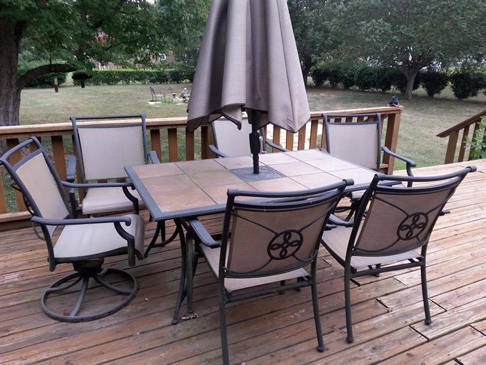 Outdoor table with 6 chairs and umbrella