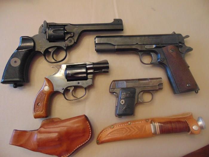 Enfield .38, Colt .45, Smith & Wesson .38, Colt .25; Ka-Bar knife