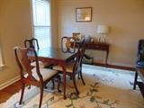 Walnut games table with four chairs; Queen Anne sofa table