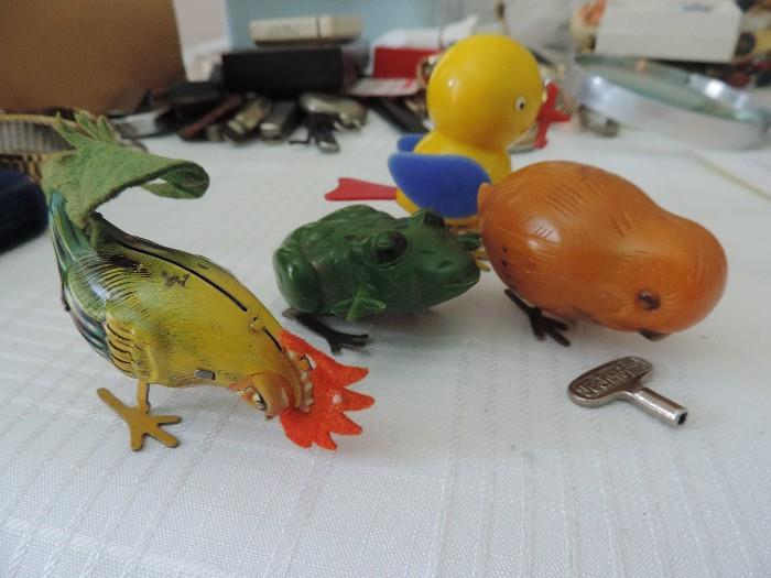Collection of Wind Up Toys: Metal Rooster with Felt decoration and plastic chick, duck and frog with winding mechanism