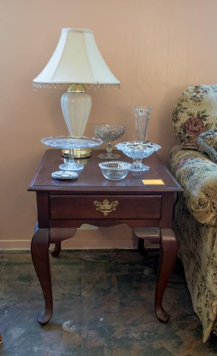 Pair of end tables, lamps, crystal and glassware.