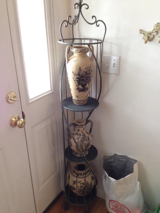 Decorative vases and metal shelf