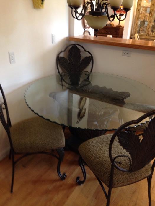 Gorgeous 54" round dining table with metal base and chairs