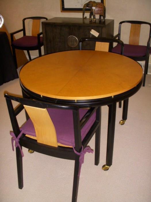Baker table and 4 chairs.  Table is shown closed, but it comes with two leaves and pads.
