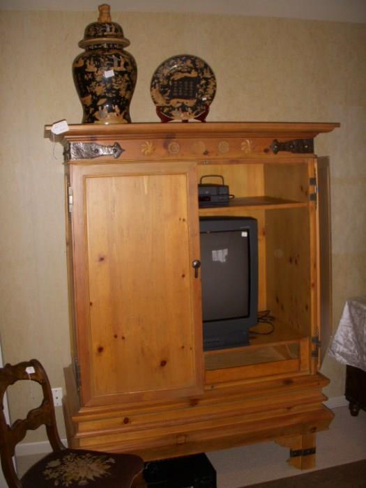 "Milling Road" by Baker TV armoire in pine