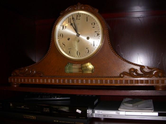 Junghans clock with window showing pendulum.  Clock runs, but doesn't strike (?)