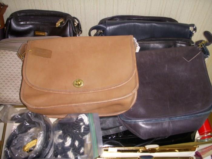 Two Coach purses, as well as others.....