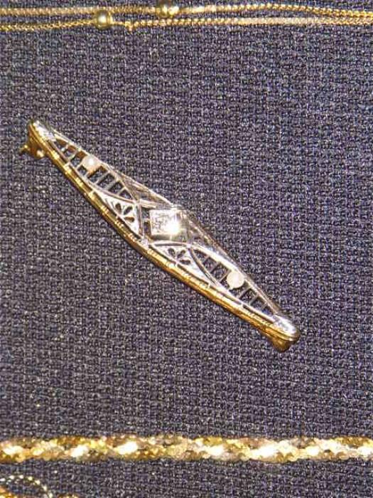 14 karat & diamonds Art Deco pin