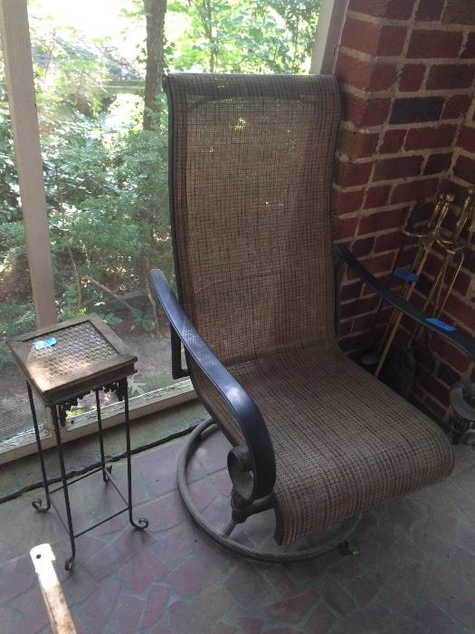 Two comfortable porch or lawn chairs that rock and swivel!  Chosen in part for high back that supports head although barely used.  (only 1 pictured) 