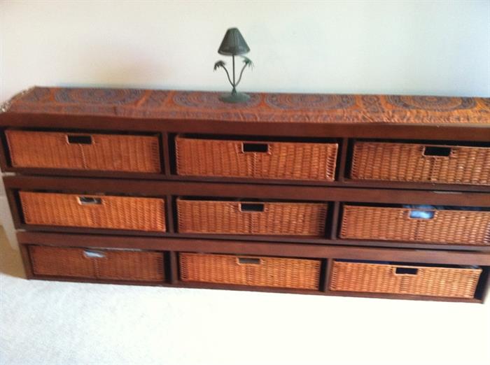 Bed frame with storage underneath or can be used as shown like a dresser with basket drawers.
