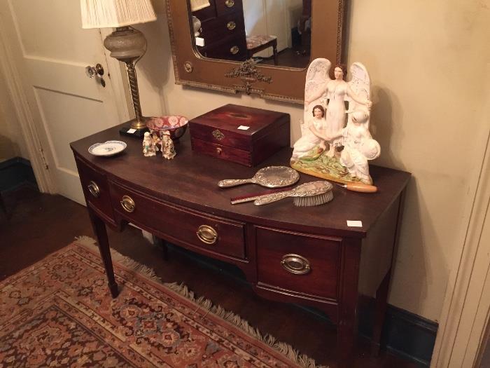 Hepplewhite style dressing table, antique oil lamp, sterling dresser set.