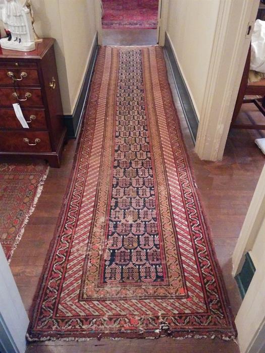 An excellent  Daghastan runner with a great deal of fine workmanship.  The rug is antique and has even wear, so that the colors and intricate design are in no way compromised.  A beautiful rug!