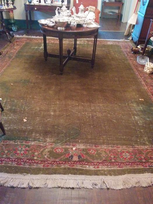 This is a striking and unusual antique MAHAL carpet with a subtle green field and beautiful border.  It has even wear.   9'  x 13'.
