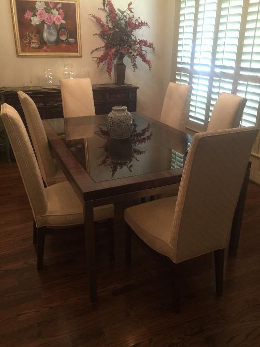 Lovely contemporary dining table with upholstered parsons chairs