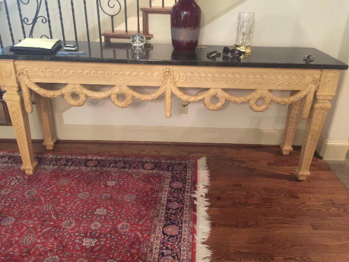 Marble top console table with carving