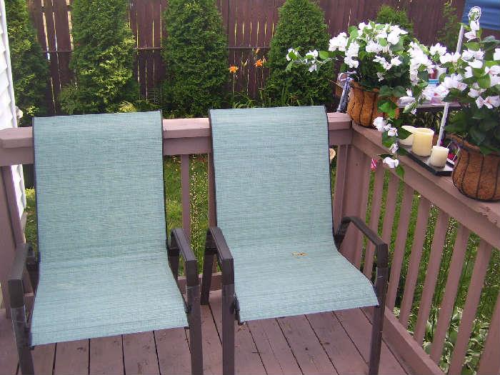 2 of 4 patio chairs