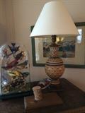 Antique Doulton Lambeth stoneware and brass lamp, Victorian taxidermy birds under glass dome and a taxidermied Painted Bunting on branch, original 20th century watercolour painting by New Haven artist Philip Plaistridge on wall.