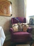 Recliner with stuffed toy owls