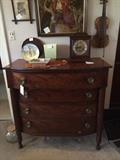 American Empire bowfront chest of drawers