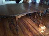 Cherry wood gate leg table on second floor
