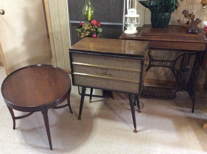 Oval table, Delmonico hifi stereo, antique Singer sewing machine