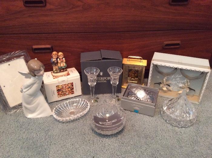 Waterford crystal, Hummel figurine,  Lladro angel, Howard Miller clock